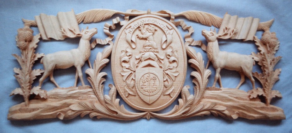 An Overall View Of The Hand Carved Plaque By Jose Sarabia - deer thistle wood carving
