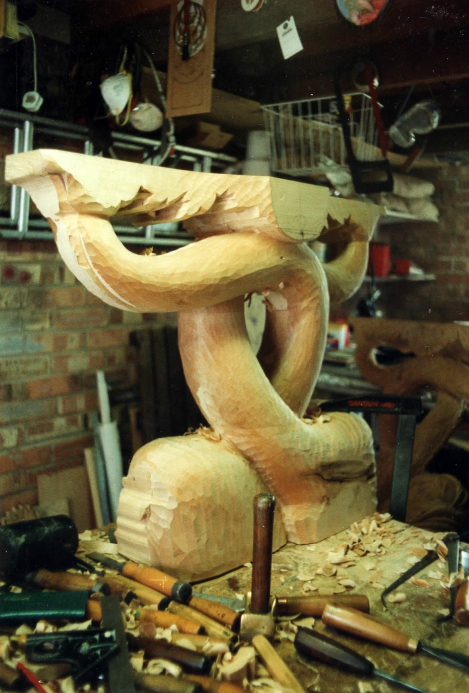 Table leg in the early stages of carving - dolphin table, console table, table legs, hand carved