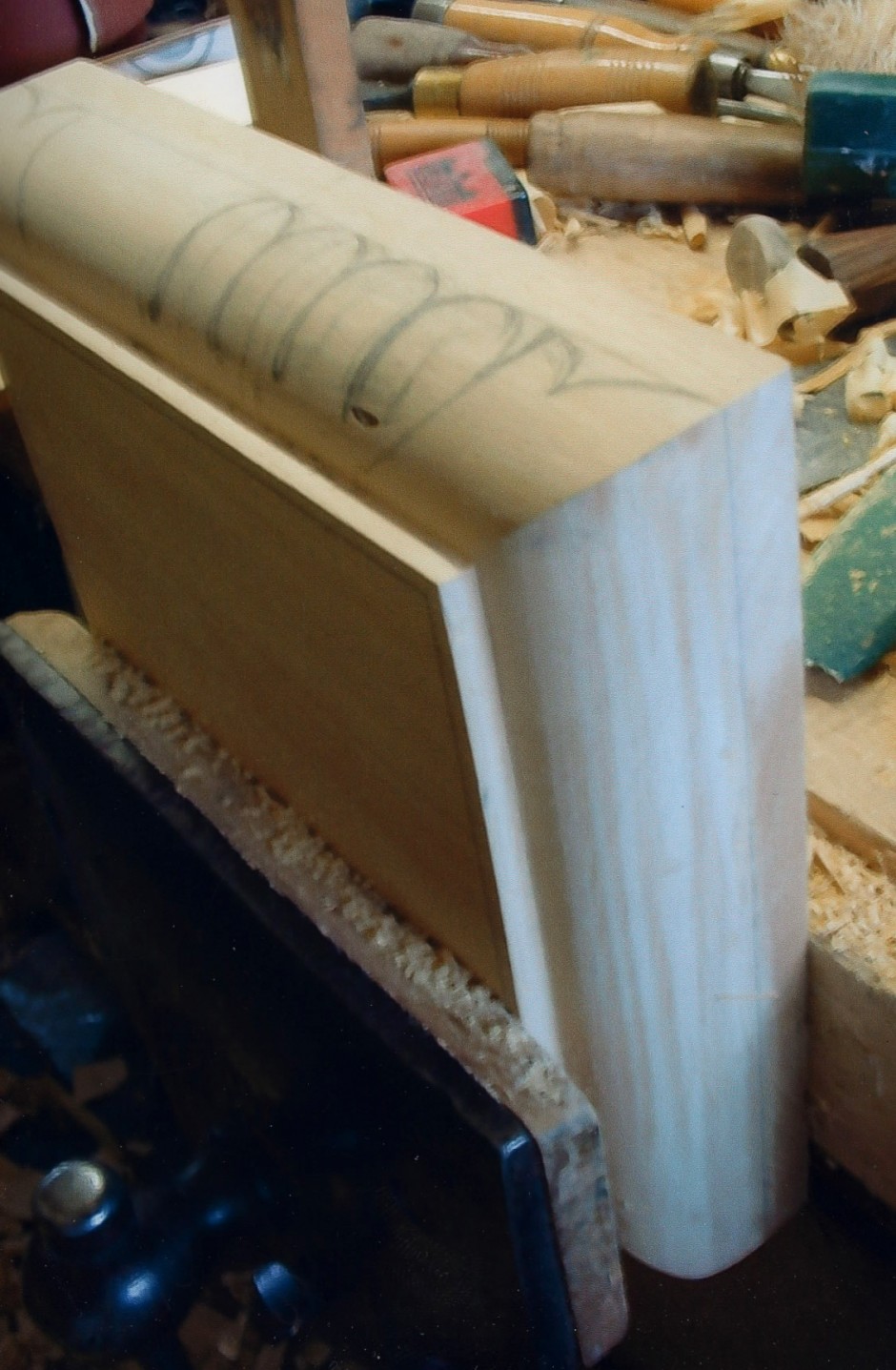 The base details are sketched onto the wood - carving, sketch, drawing, work in progress, carving