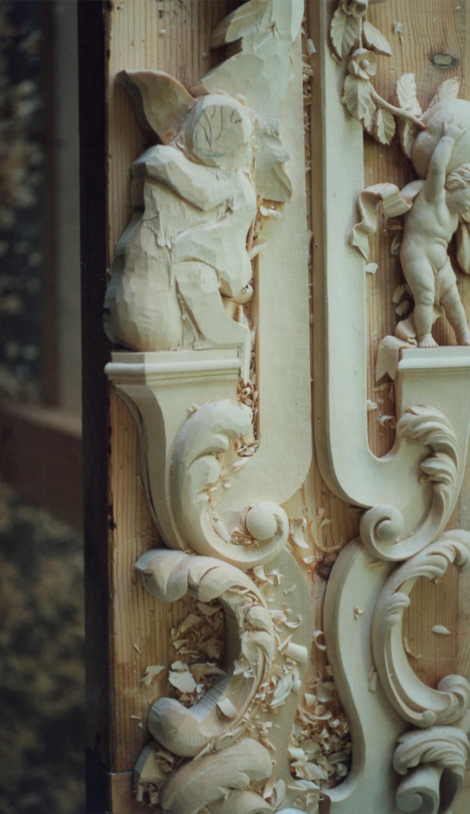 The mirror frame lower sides in progress - mirror carving how to carve cherub