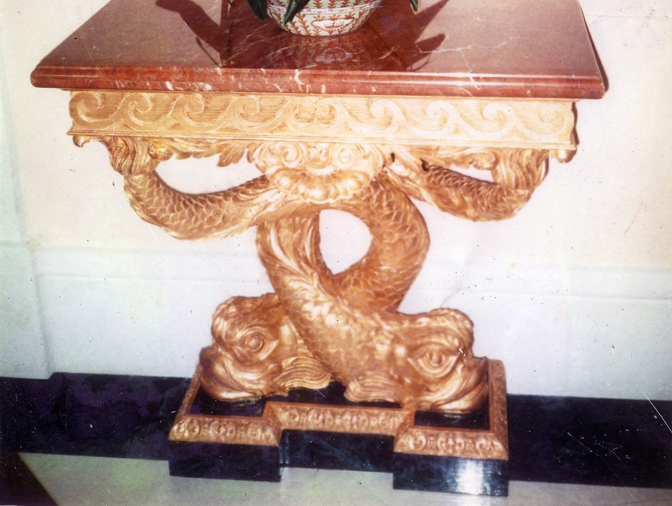 The original console table to be reproduced - console table with dolphin feature legs guilded