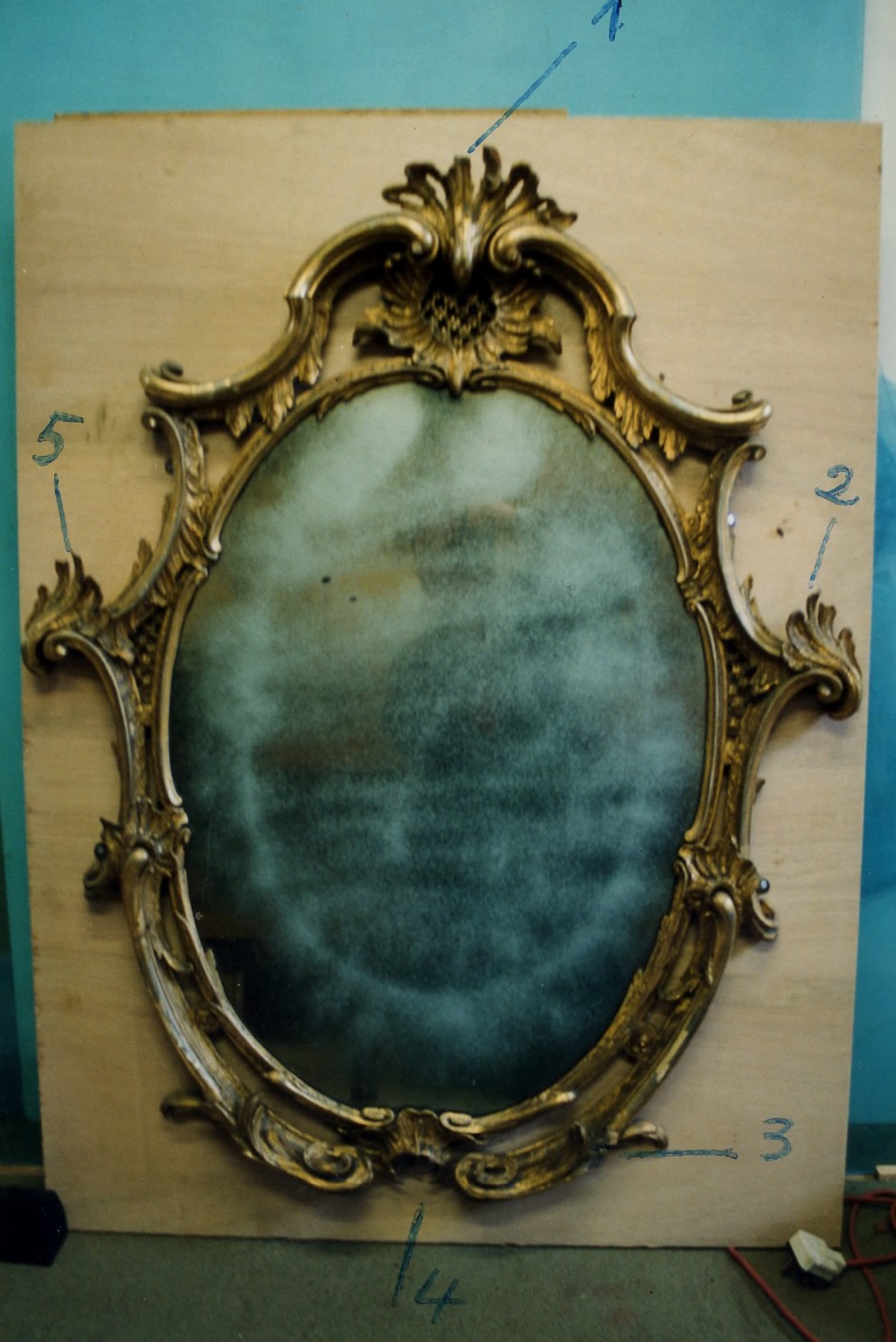 The original mirror prior to restoration - mirror needing restoration