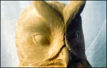 Owl carved in wood to form mould for stone casting