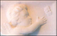Cherub chasing Butterfly in Marble